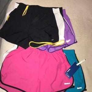 2 nike shorts and two reebok shorts